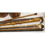 Five silver mounted walking canes, a root-wood stick and three others, (9).