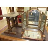 A gilt framed triptych dressing table mirror, 72cm high, a Georgian style mahogany wall mirror, 60 x