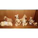 Eight beige glazed SylvaC dog ornaments, no.s: 2025, 114 (af), 1119, 1378, 1205, 73, 116, 1433, (