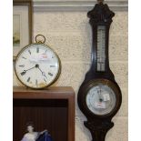 An oak framed aneroid barometer/thermometer, 54cm high and a brass drum mantel timepiece, dial af,