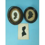 A 19th century oval gilt and black miniature portrait of a lady, 9 x 5cm and two other