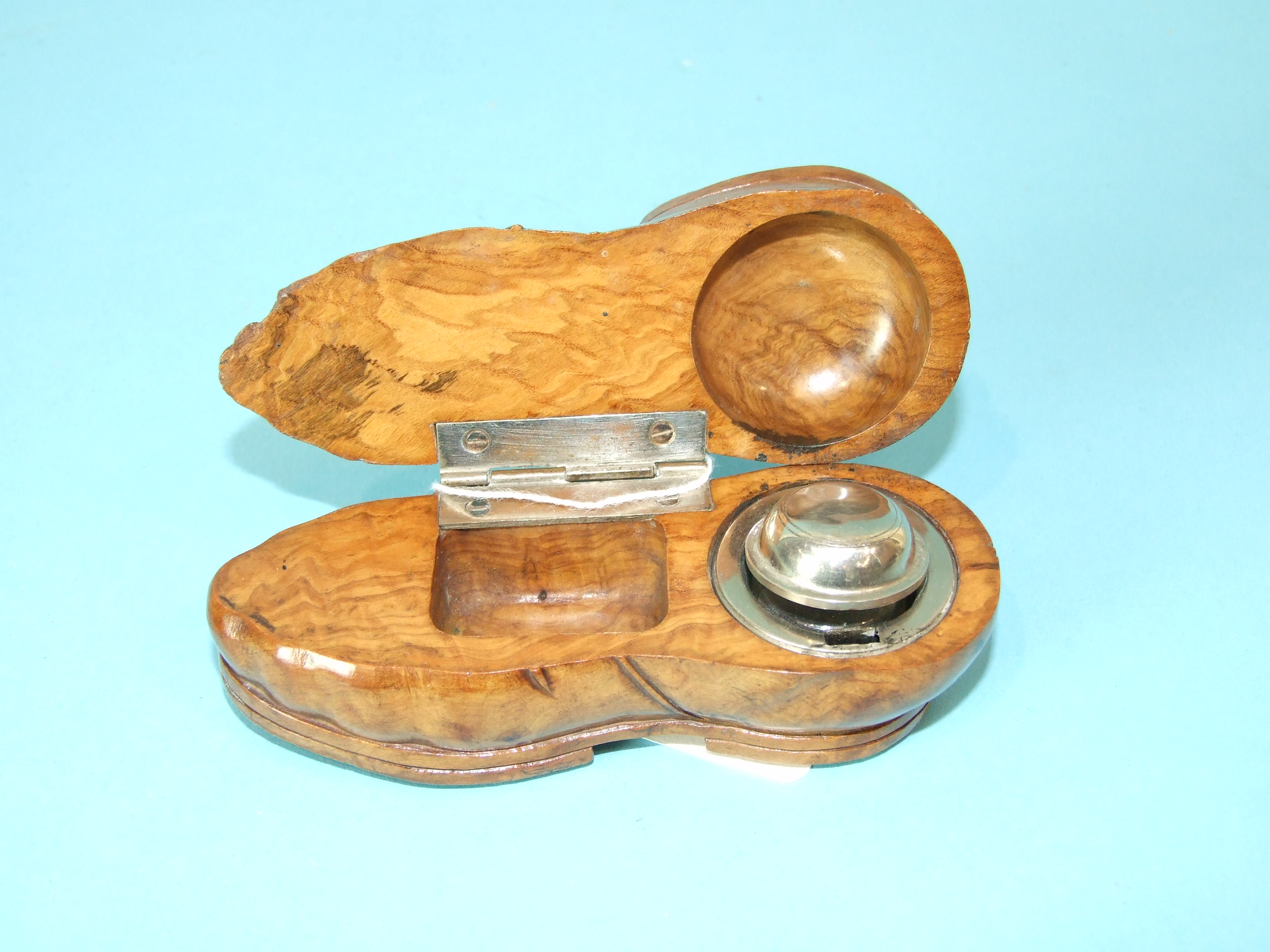 A carved root wood inkwell in the form of a boot, the hinged lid revealing a glass lined inkwell, - Image 2 of 2