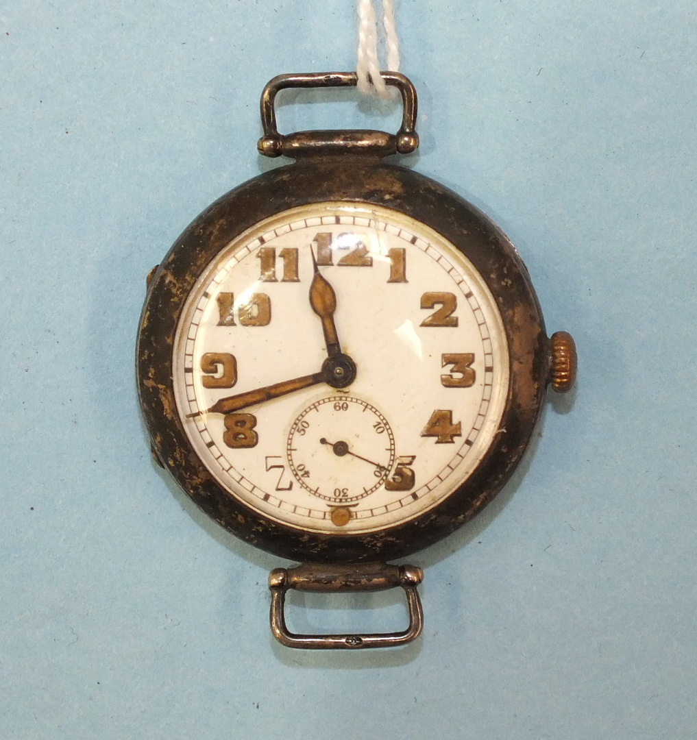 Moeris, a silver-cased trench-watch-style wrist watch with white enamel dial, Arabic numerals and