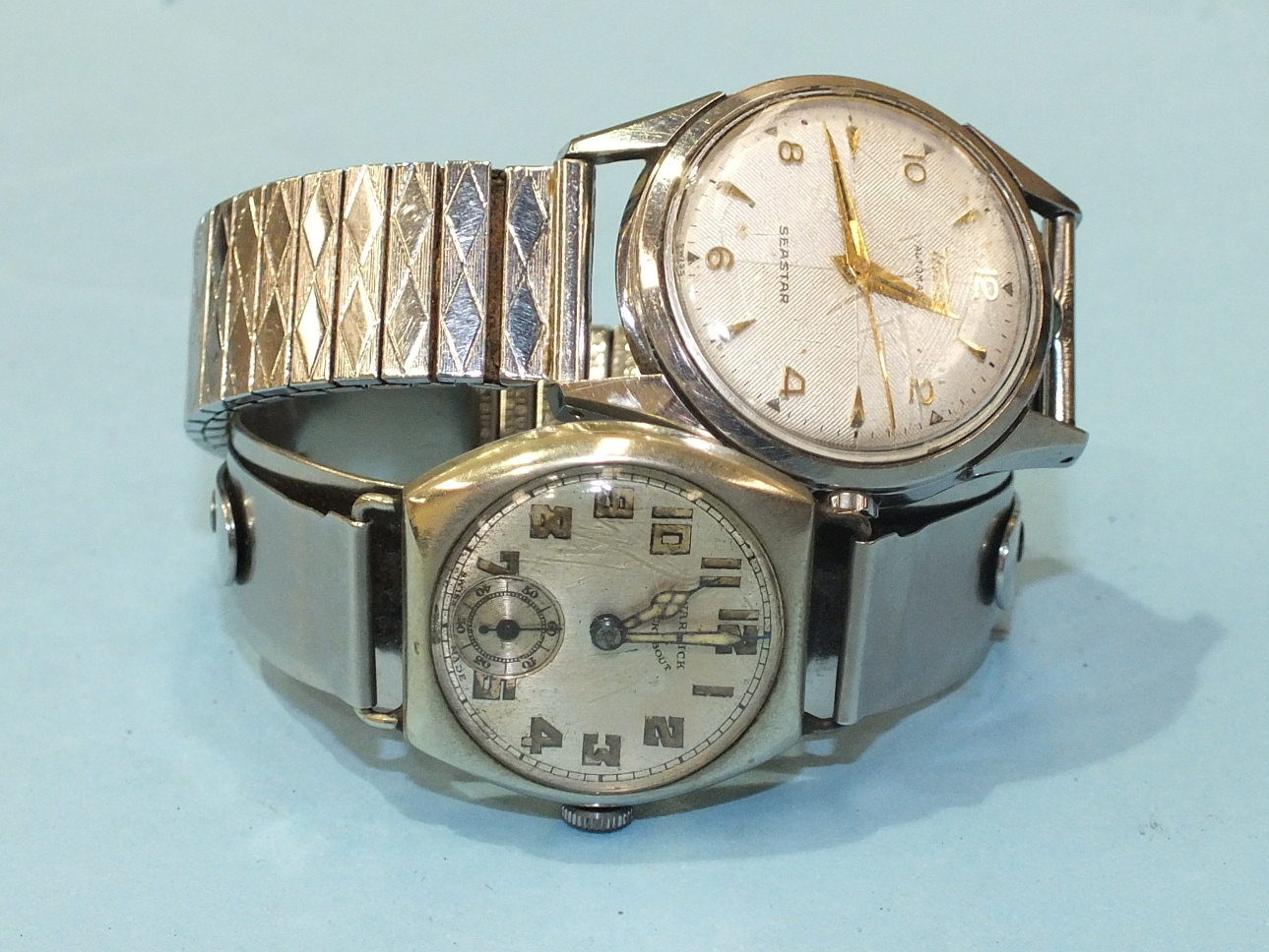 Tissot, a 1950's gents Seastar Automatic wrist watch with steel case and a steel-cased 1930's