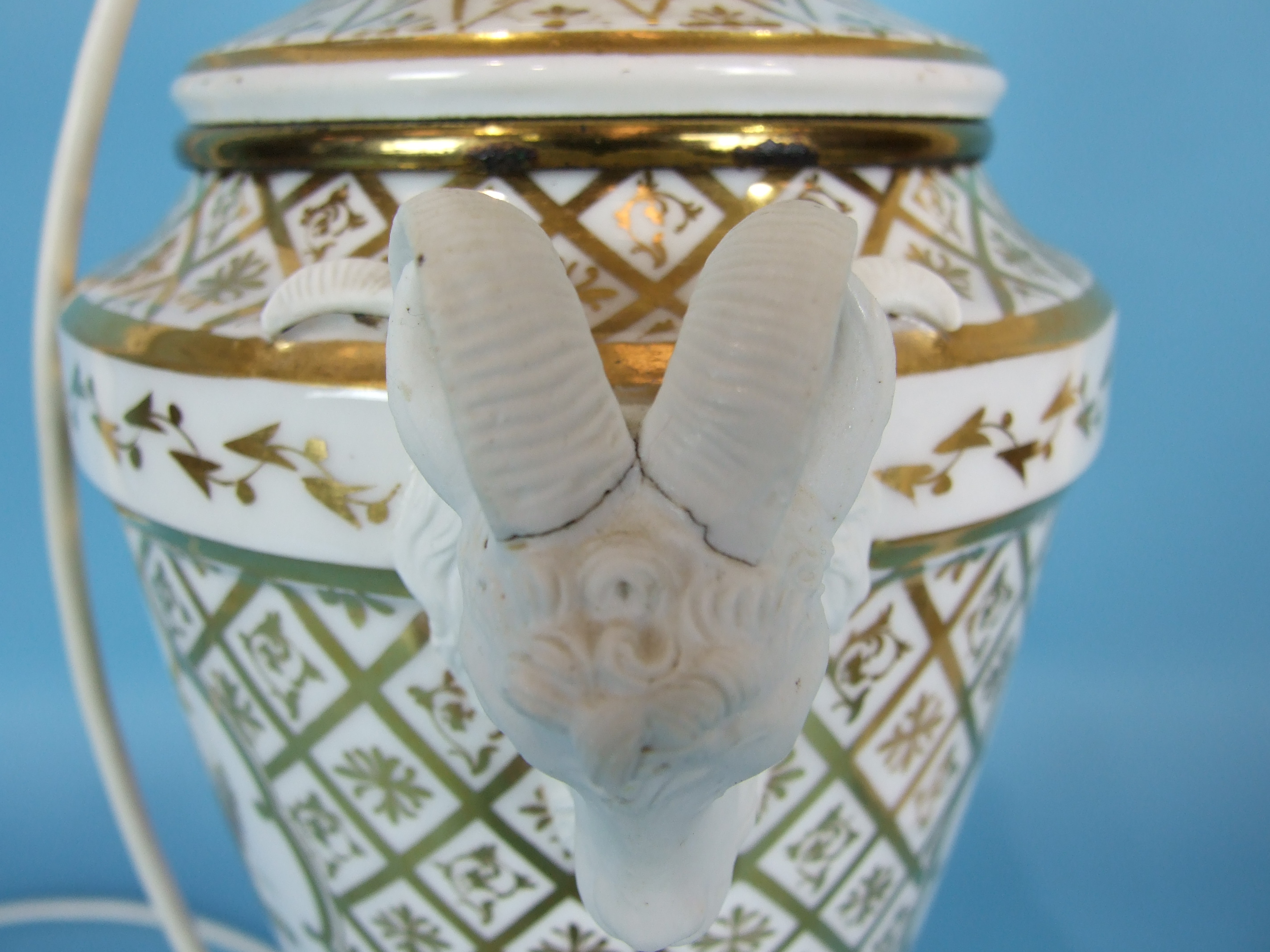 A large 19th century French porcelain vase decorated with panels of flowers on a white and gilt - Image 3 of 4