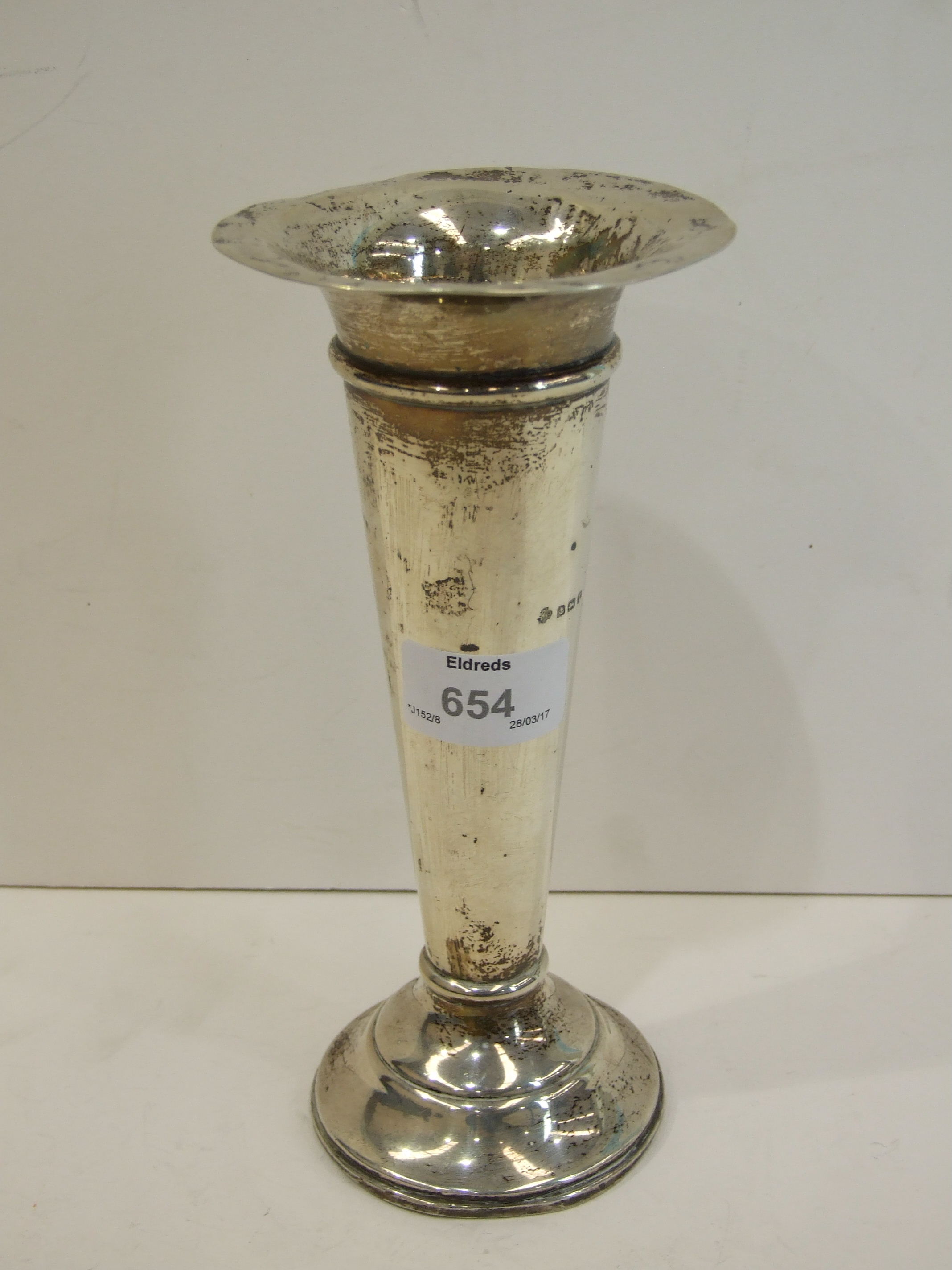 A plain loaded spill vase with flared rim, 20cm high, Birmingham 1916.