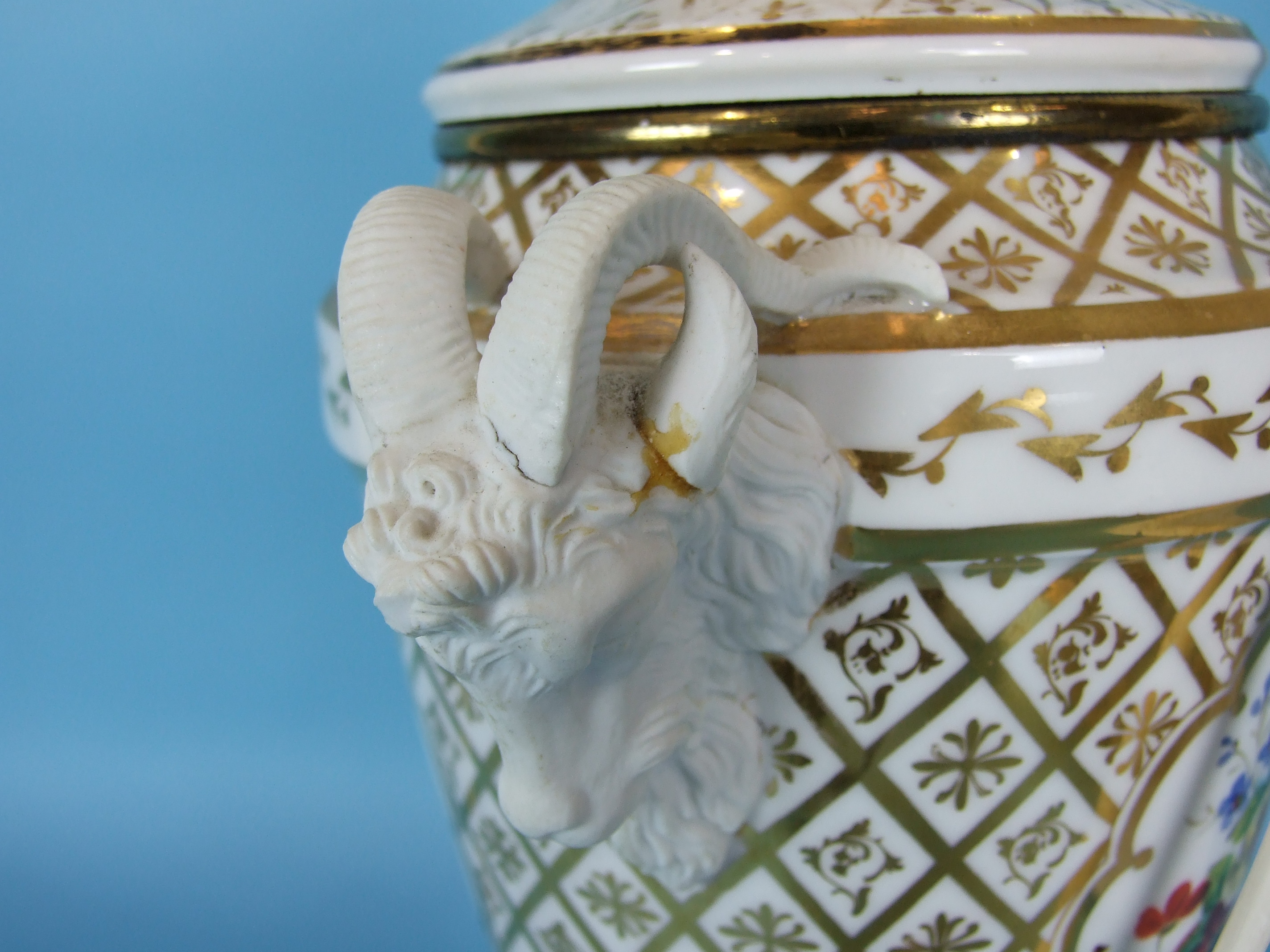 A large 19th century French porcelain vase decorated with panels of flowers on a white and gilt - Image 4 of 4