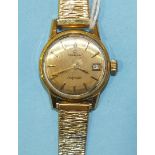 Omega, a ladies Seamaster Ladymatic gold-plated wrist watch with circular dial, baton numerals and