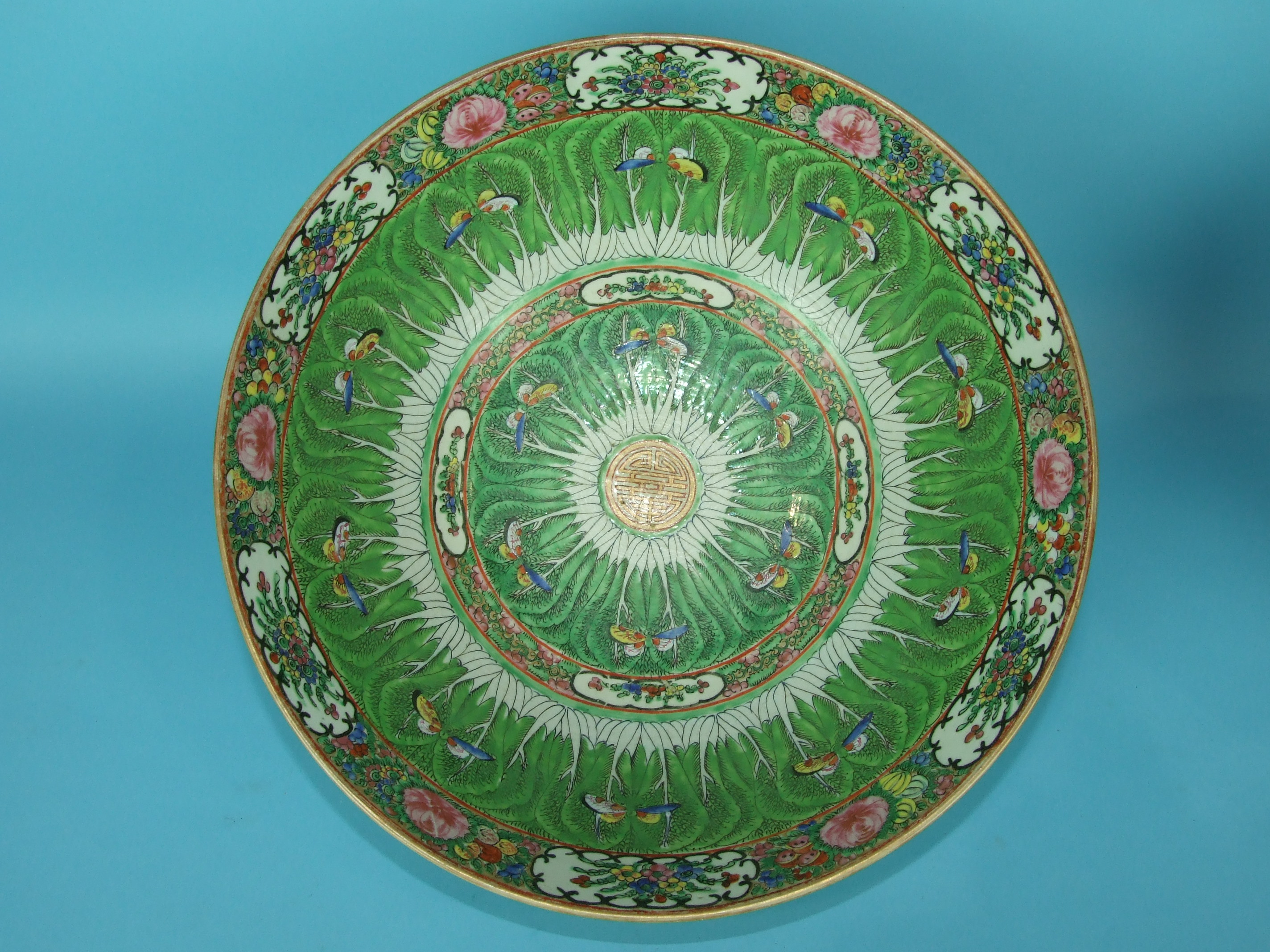 A large early-20th century Chinese Canton-style 'cabbage leaf' punch bowl decorated in coloured - Image 2 of 3