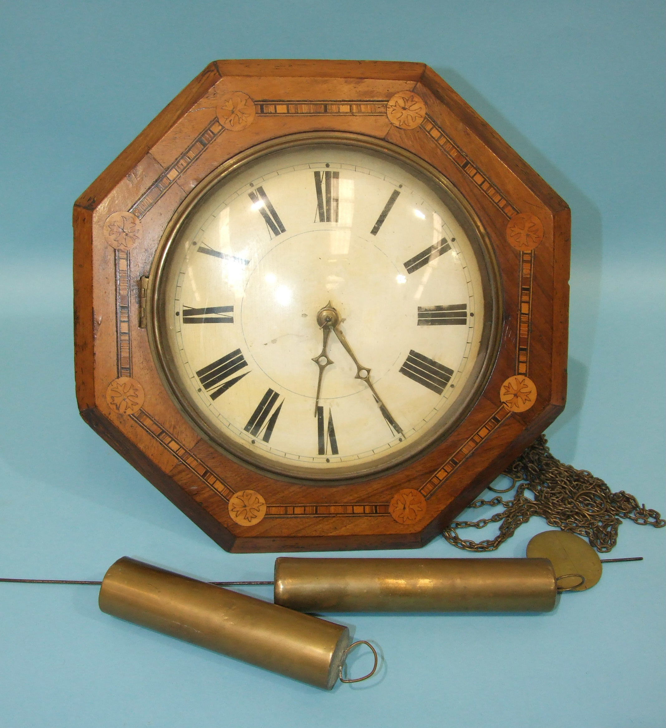 A 19th century walnut and marquetry hanging wall clock, the octagonal marquetry case with white-