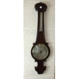 A 19th century rosewood wheel barometer with silvered thermometer scale and circular dial, signed 'C