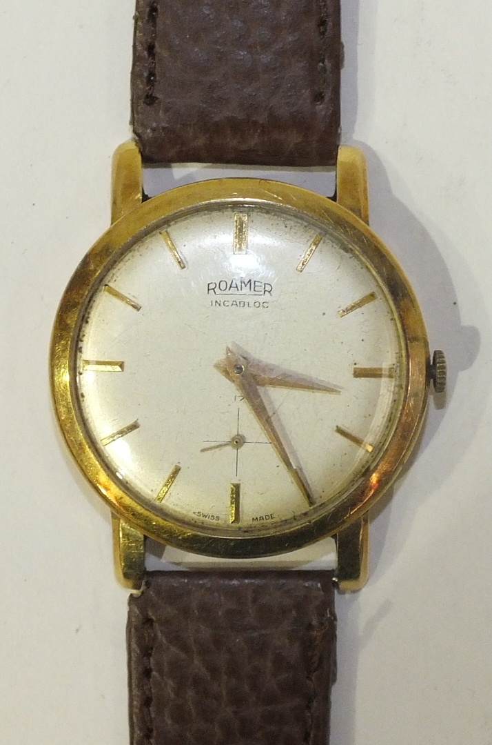 Roamer, a gentleman's 14k-gold-cased Incabloc wrist watch the silvered dial with baton numerals