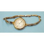 J W Benson, a ladies 9ct-gold-cased wrist watch on 9ct gold expanding bracelet, total weight 20.5g.