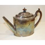 A George III oval teapot by Peter & Ann Bateman, of plain, slightly-tapered form, with wood finial