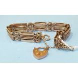 A 9ct rose gold gate-link bracelet with padlock clasp, 18.2g.