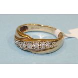 A 9k gold ring set seven brilliant-cut diamonds, size N, 3.3g.