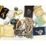 A large chalcedony brooch, a silver ARP lapel brooch, two iron leaf brooches and a quantity of