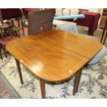 A Georgian mahogany D-end dining table on square tapering legs and having two leaves, 249 x 120cm