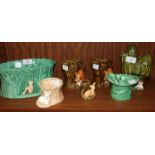 A SylvaC green glaze oval jardinière with pixie, no.2049, two tree stump with squirrel vases, no.