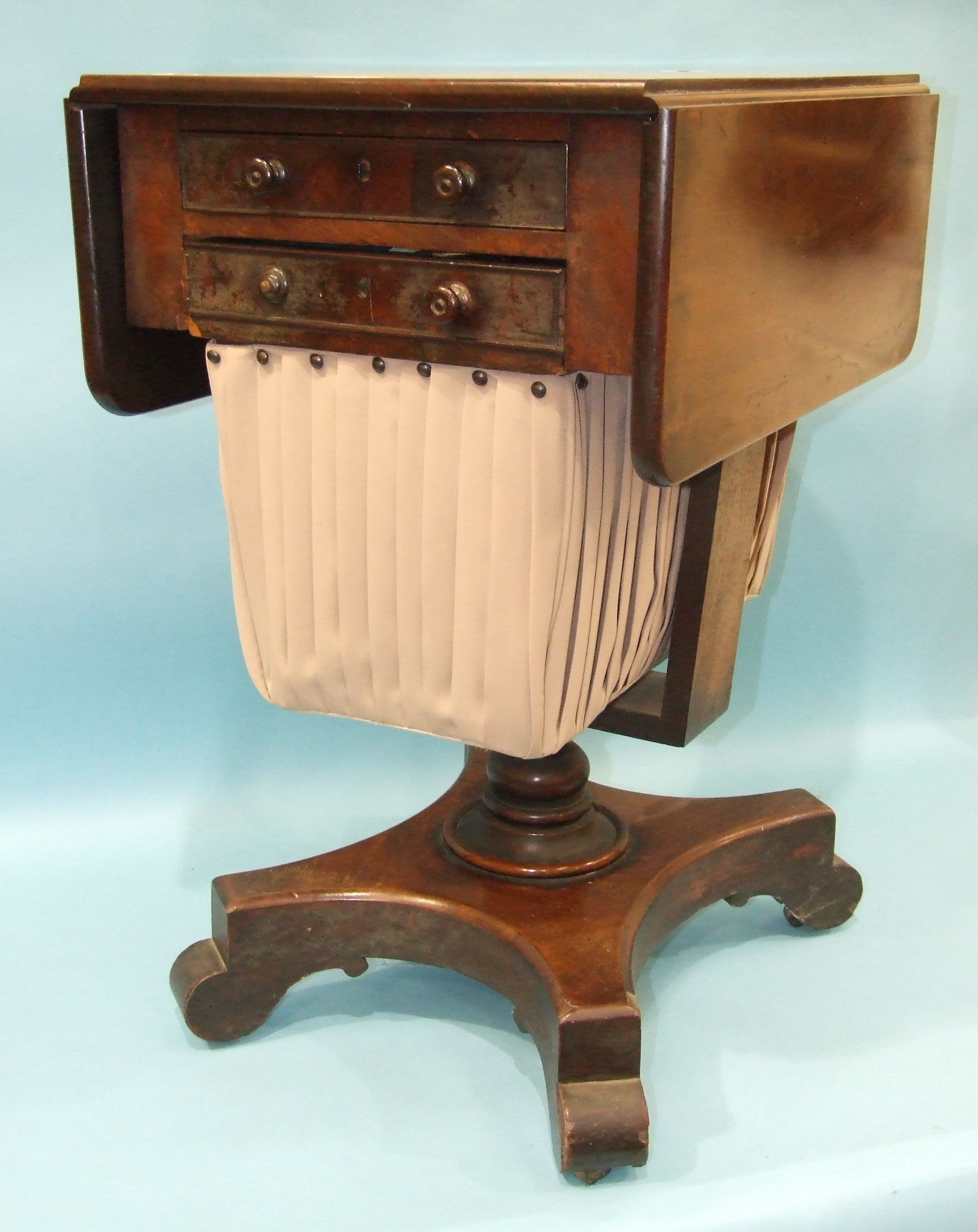 A William IV mahogany work table, the rectangular top with two drop leaves above a pair of drawers