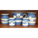 A T G Green blue and white Cornishware milk jug, two similar spice and pepper storage jars and