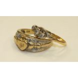 An 18ct gold cross-over ring set three diamonds, size M, 2.1g and a 9ct gold ring set diamond