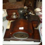 An inlaid striking mantel clock (movement damaged), a wooden model cradle, LP and 78rpm records,