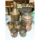 A pair of cow horn beakers with plated linings, brass eastern planters and other metalware, three