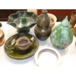 A collection of glazed pottery objects, all marked ME, including a table water feature and two domed