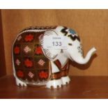 A Royal Crown Derby paperweight, "Imari Elephant", gold stopper 11cm high, boxed.