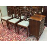 A reproduction serpentine chest of three small drawers, 53cm wide, a reproduction occasional table