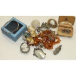 Three shell cameo brooches, a small quantity of silver jewellery and other jewellery.