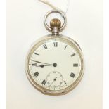 An engine-turned silver-cased open face pocket watch, the white enamel dial with Roman numerals