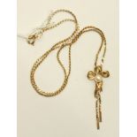 A 9ct gold necklet set a cultured pearl on a bow motif, 6g.