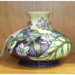 A late-20th century Moorcroft "Borage" pattern vase of squat globular form, decorated with blooms