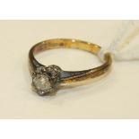 A solitaire diamond ring set a brilliant-cut diamond of approximately 0.2cts in 18ct gold mount,