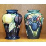 A small Moorcroft vase decorated with orchids, 9cm high, impressed Moorcroft, Made in England to