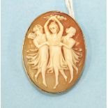 An oval shell cameo depicting the Three Graces in unmarked yellow gold mount, 35mm x 27mm, 9.9g.