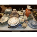 Three ceramic and tin hot water plates, a collection of part tea and dinner services and other