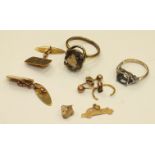 A pair of 9ct gold cufflinks (af), 4g, and other items.