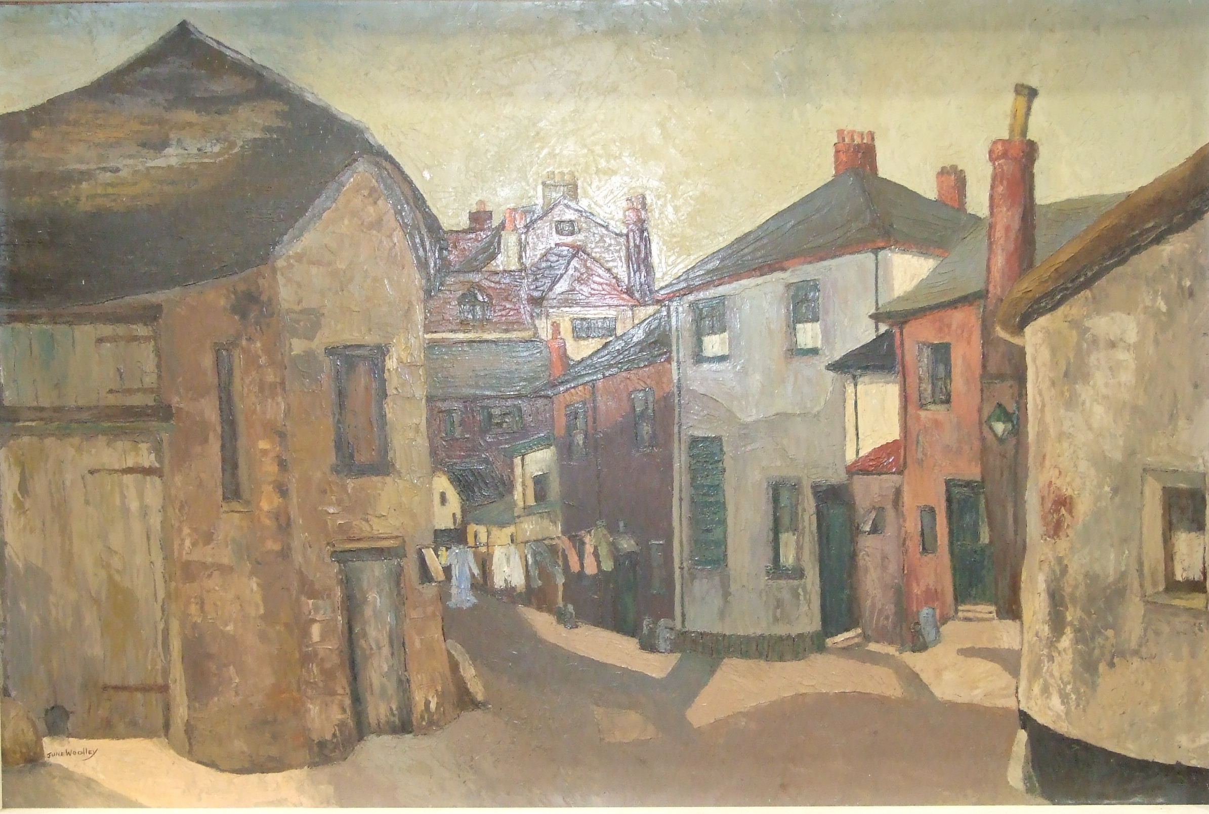 June Woolley, 'Courtyard, Moretonhampstead', a signed oil on board, 49 x 74.5cm, titled verso.