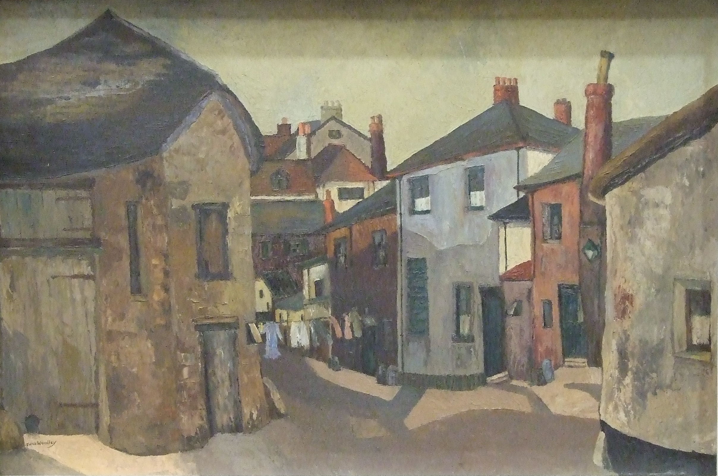 June Woolley, 'Courtyard, Moretonhampstead', a signed oil on board, 49 x 74.5cm, titled verso. - Image 2 of 2