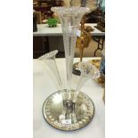 A 19th century English three-branch epergne with fern-engraved flutes, on a circular mirrored stand,