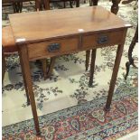 An early-20th century mahogany hall table, the rectangular top above two frieze drawers, on square