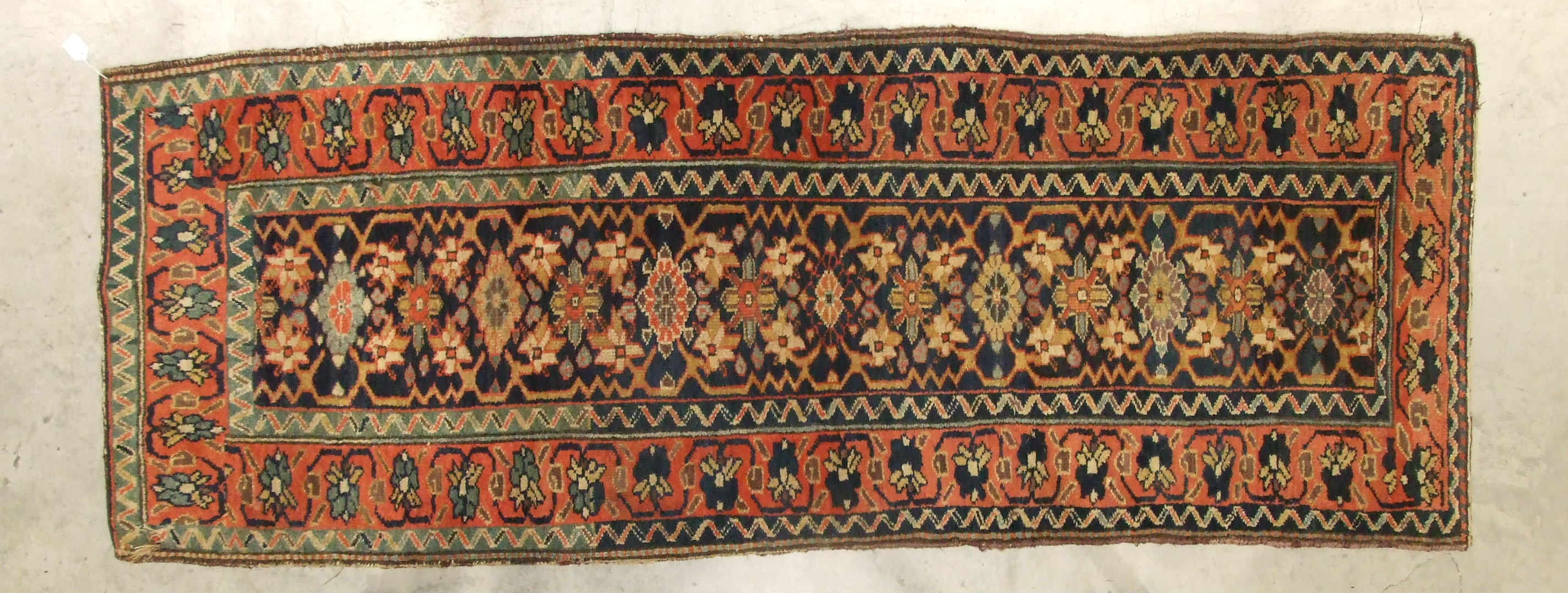 A mid-20th century Oriental runner decorated with six central hooked lozenge medallions, with a - Image 3 of 3