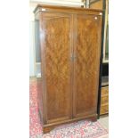 A mid-20th century walnut two-door wardrobe, 95.5cm wide.