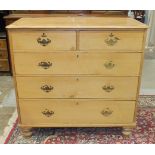 A late-19th/early-20th century stripped pine straight-front chest of two short and three long