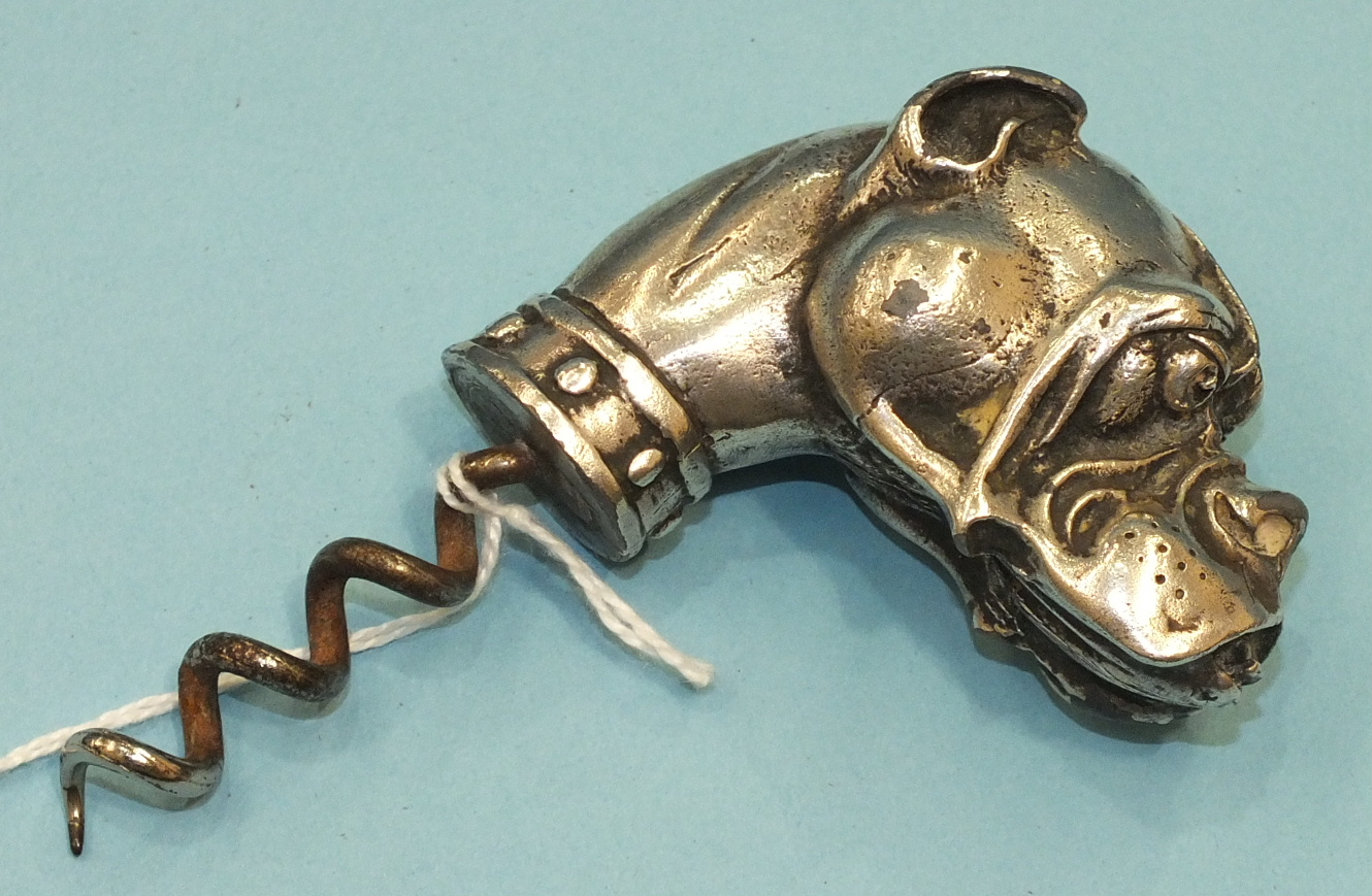 A modern plated metal corkscrew in the form of a bulldog's head, 10cm.