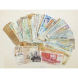 A collection of foreign banknotes.