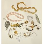 Two paste-set bird brooches, a paste-set silver cross pendant and other costume jewellery.